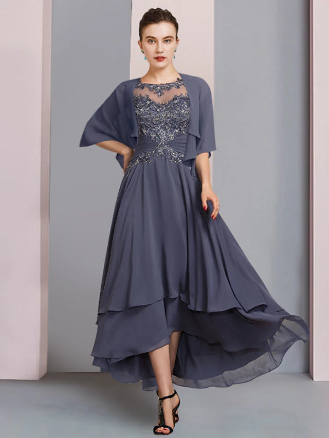 Elegant two-piece A-line Mother of the Bride dress with scoop neck, short sleeves, and tea-length skirt.
