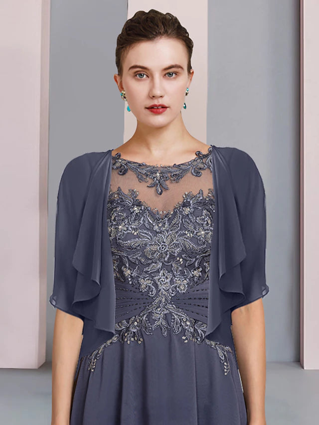 Back view of the elegant two-piece A-line Mother of the Bride dress, showing the asymmetrical tea-length hem.