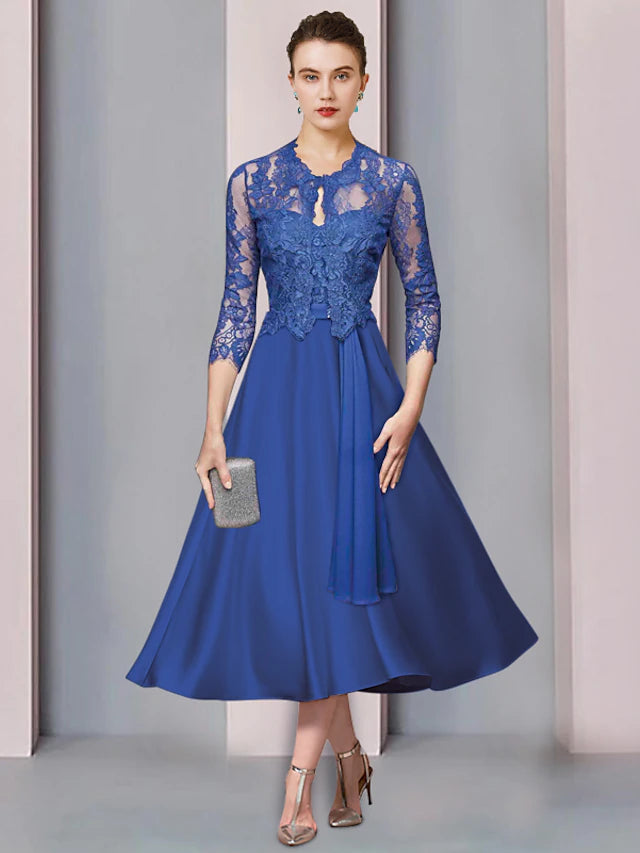 Elegant two-piece A-line Mother of the Bride dress with strapless top and tea-length skirt.