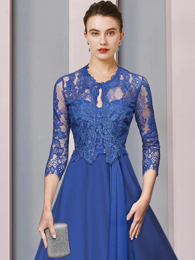 Back view of the elegant A-line tea-length Mother of the Bride dress with ruching.