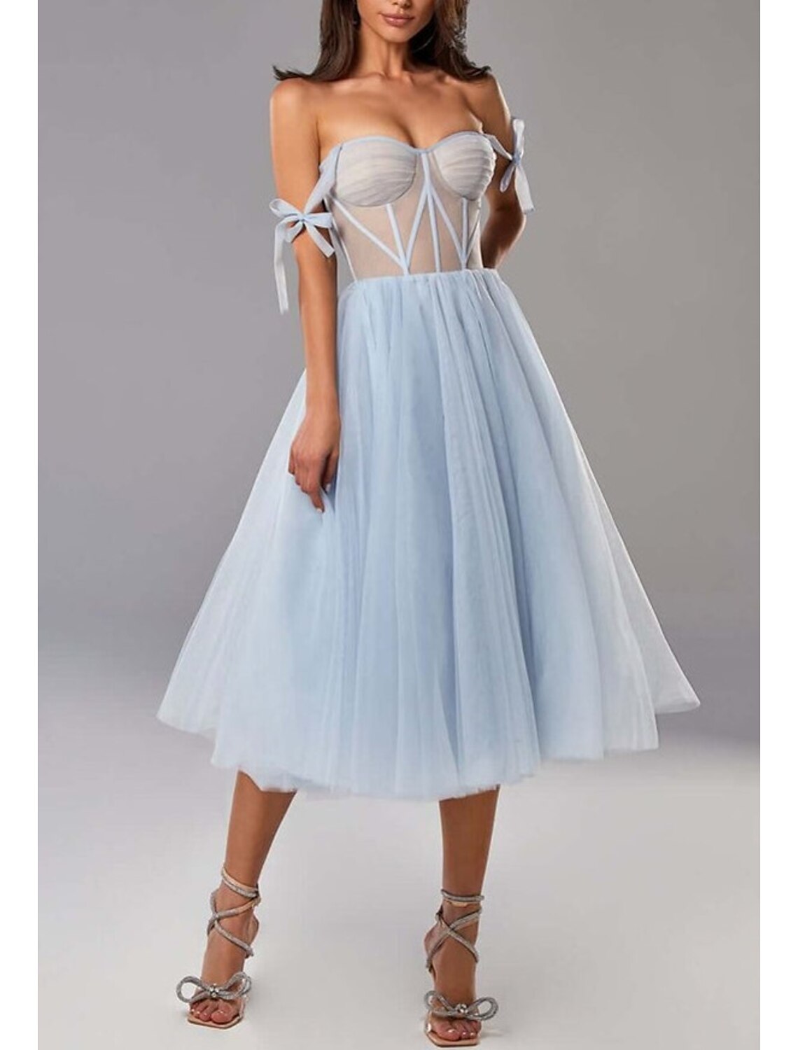 Back view of the two-piece A-line wedding guest dress.