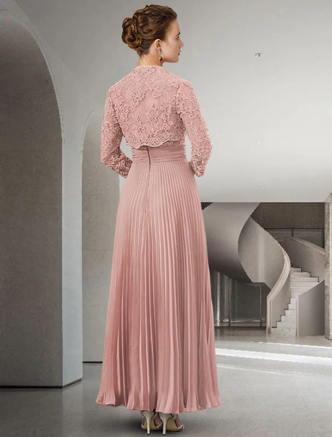 Close-up of the sweetheart neckline and lace details on the Mother of the Bride dress.