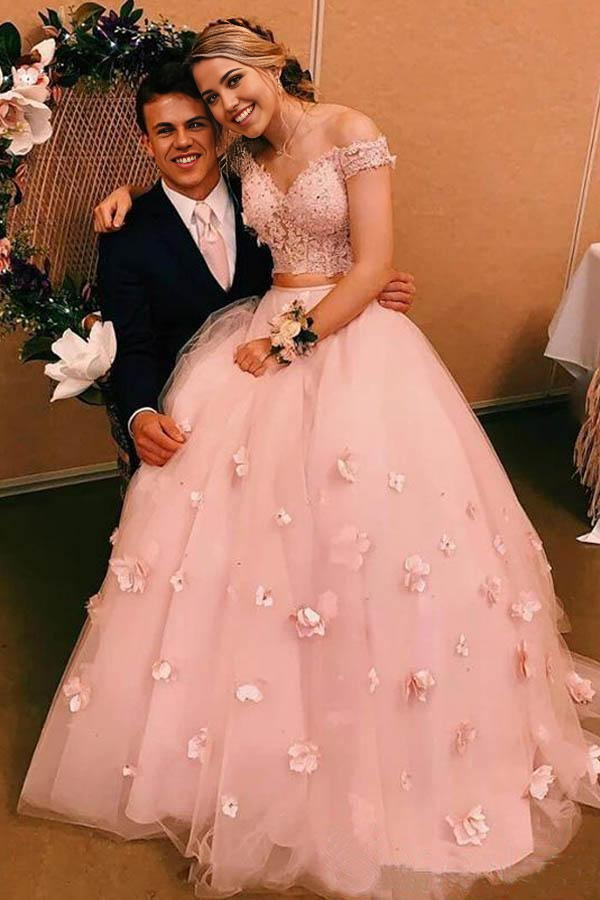 Full view of a two-piece V-neck wedding gown with delicate 3D floral appliques.