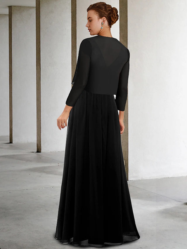 Back view of the floor-length chiffon Mother of the Bride dress with pleats and sash.