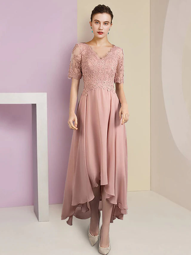 Back view of the A-line chiffon and lace dress with pleats.