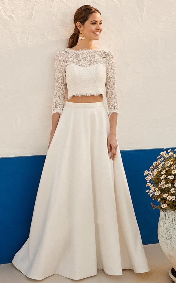 Elegant two-piece A-line V-neck lace wedding dress with 3/4 sleeves and ruching.