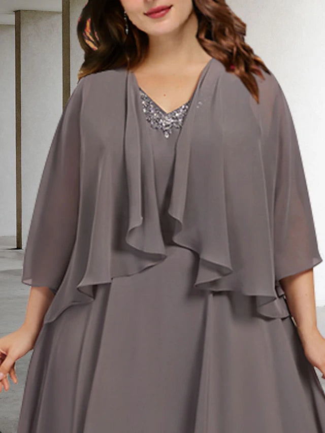 Back view of the tea length chiffon mother of the bride dress.