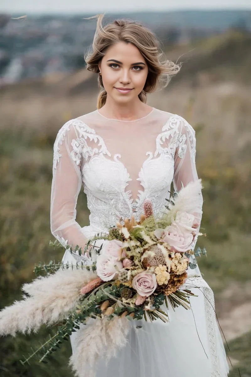 Bohemian two-piece wedding dress with illusion lace sleeves and court train.