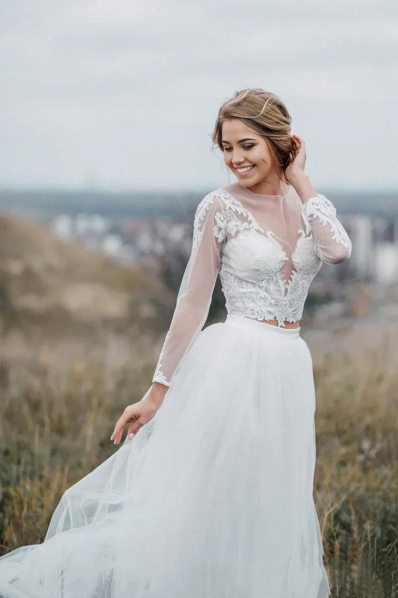 Side profile of a bride in a two-piece bohemian wedding dress with V-neck.