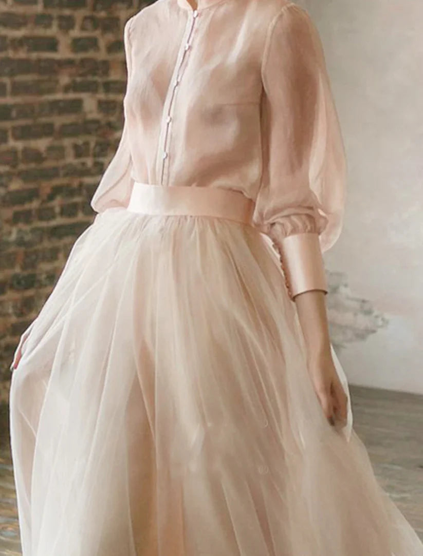 Full length view of the two-piece tiered chiffon dress, suitable for formal events.