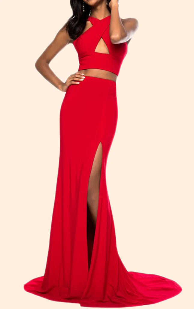 Model wearing a green two-piece halter mermaid long prom dress.