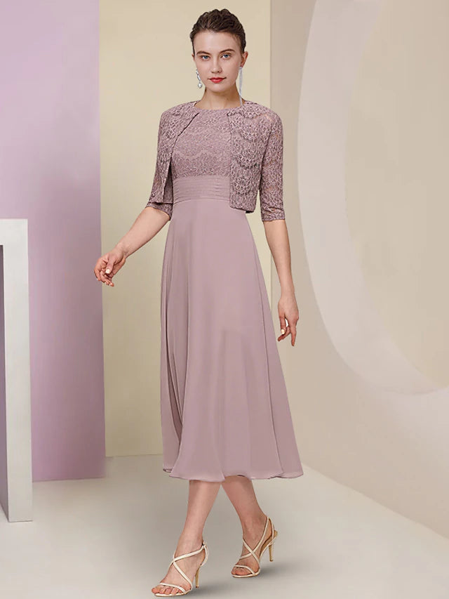 Back view of the tea-length chiffon and lace two-piece dress.