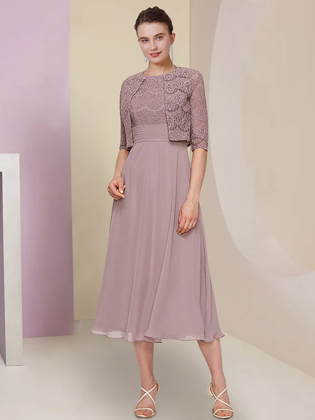 Side profile of the elegant two-piece dress, showcasing lace details.