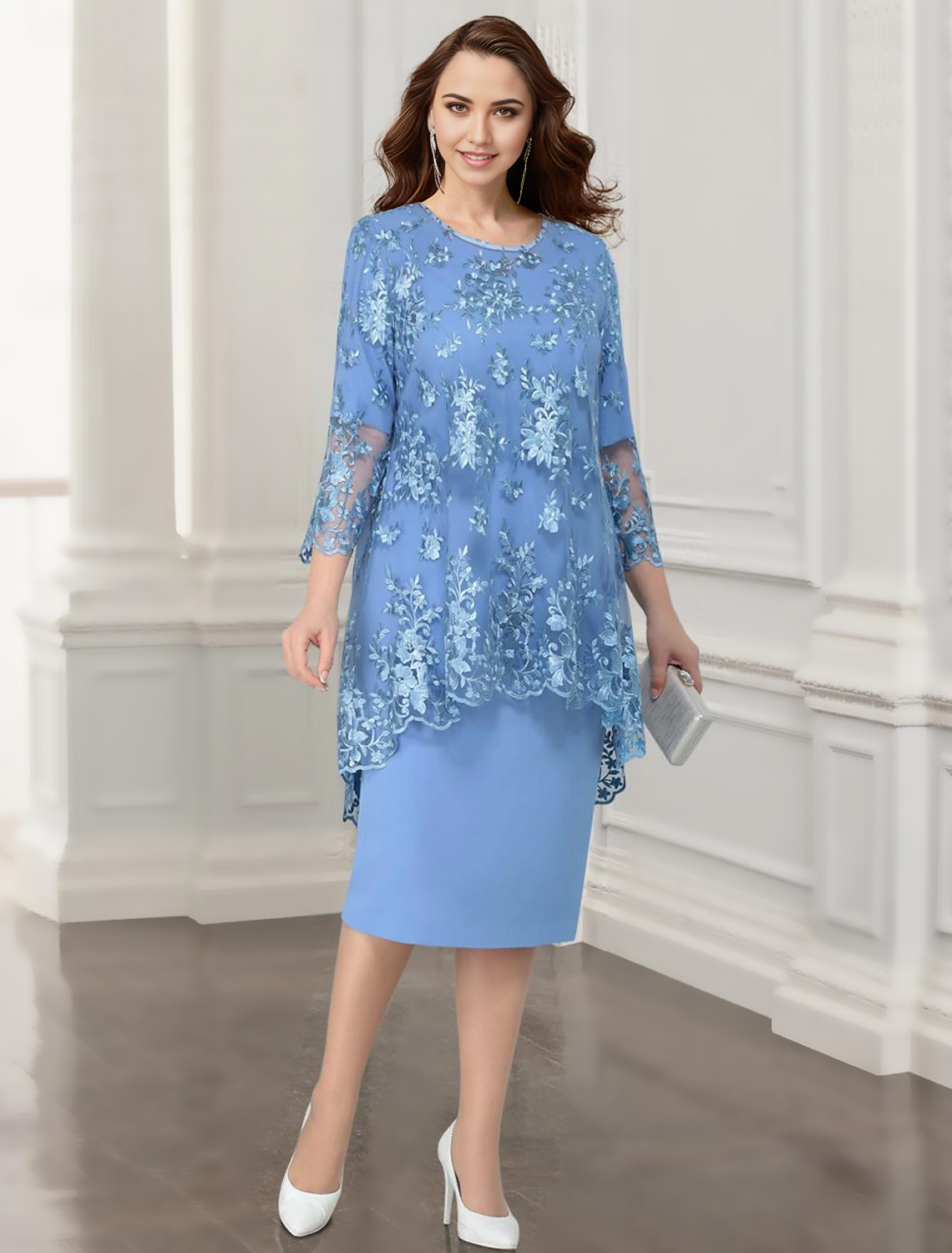 Elegant woman in a two-piece lace and chiffon mother of the bride dress with jacket.