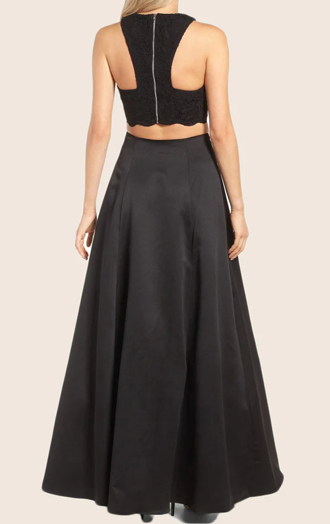 Back view of the two-piece sleeveless formal gown with satin skirt.