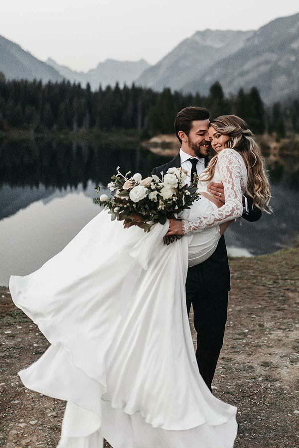 Side profile of the elegant ivory bridal gown.