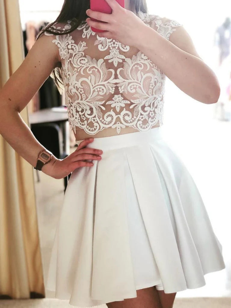 Model wearing a two-piece lace V-neck short A-line dress.