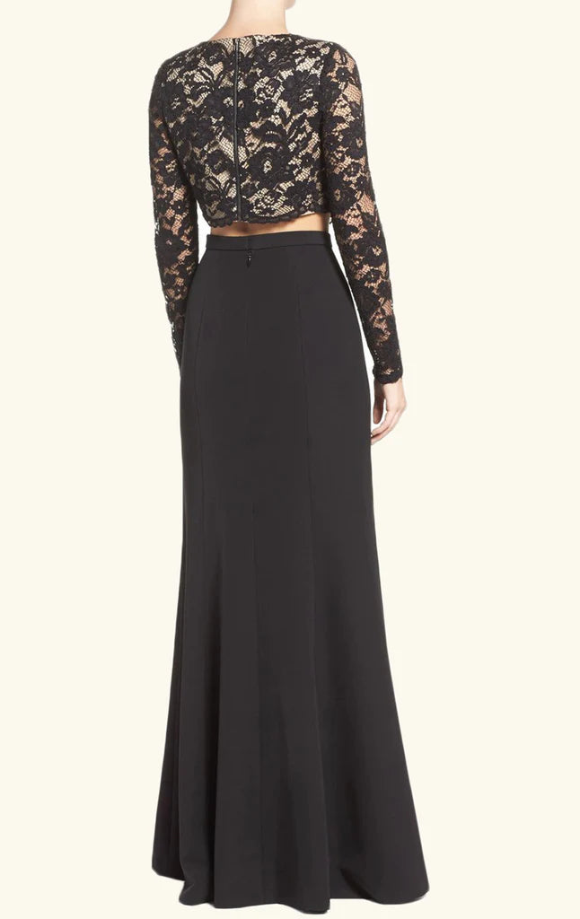 Close-up of the lace top and flowing skirt of the formal evening gown.