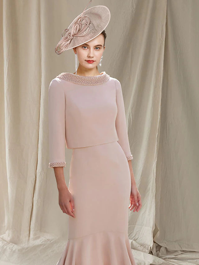 Elegant two-piece mermaid mother of the bride dress with a square neck and short beaded jacket.