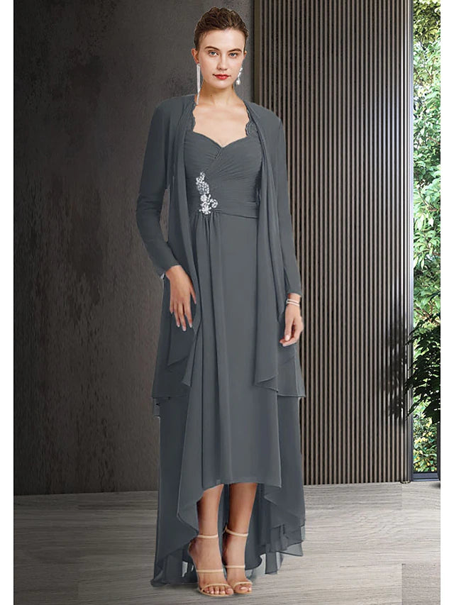 Elegant two-piece Mother of the Bride dress with bateau neck and 3/4 sleeve jacket.