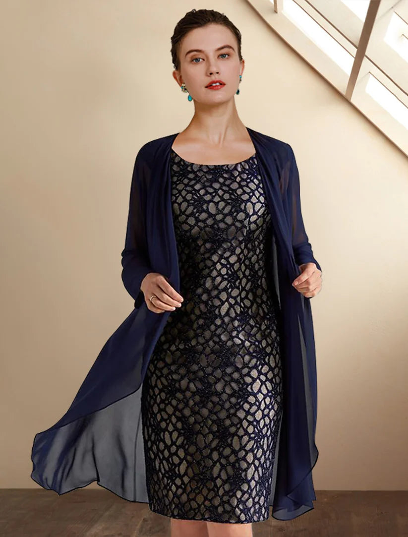 Model showcasing the knee-length two-piece Mother of the Bride dress with intricate lace appliques on the jacket.