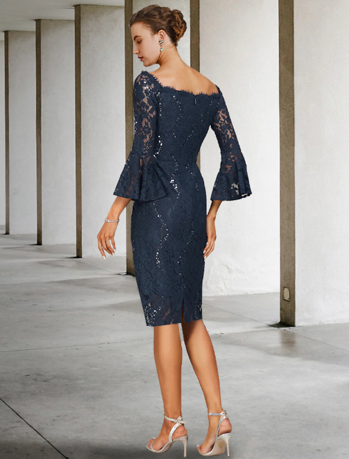 Detail of the chiffon and lace fabric texture on the formal dress.