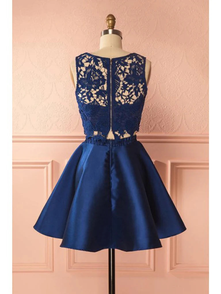 Model wearing a two-piece round neck lace short prom dress, side view.