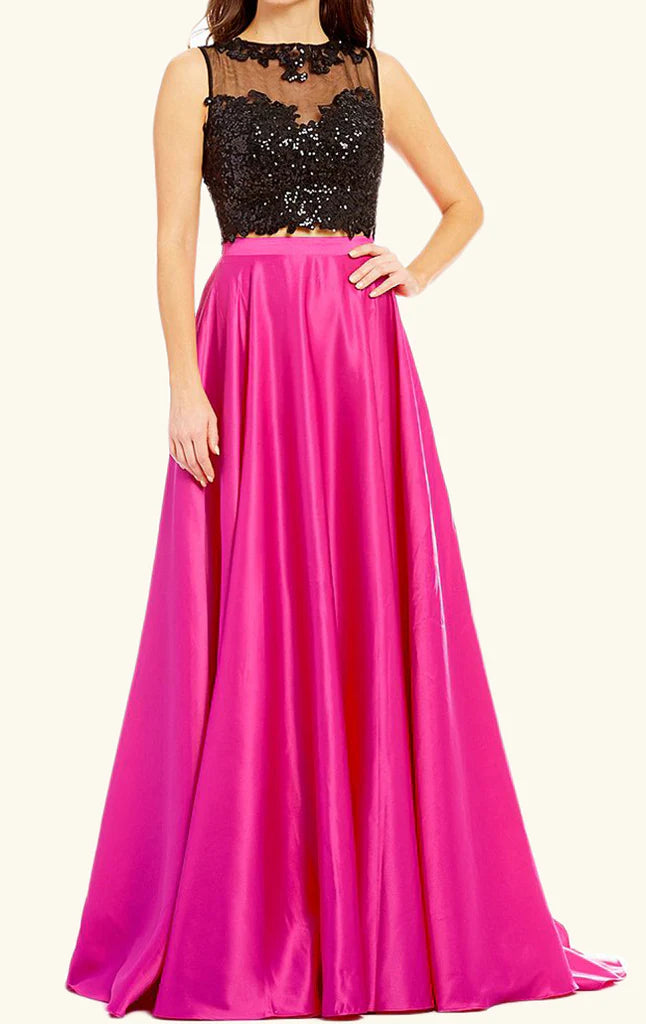 Model wearing a two-piece sequin bodice and satin long prom dress.