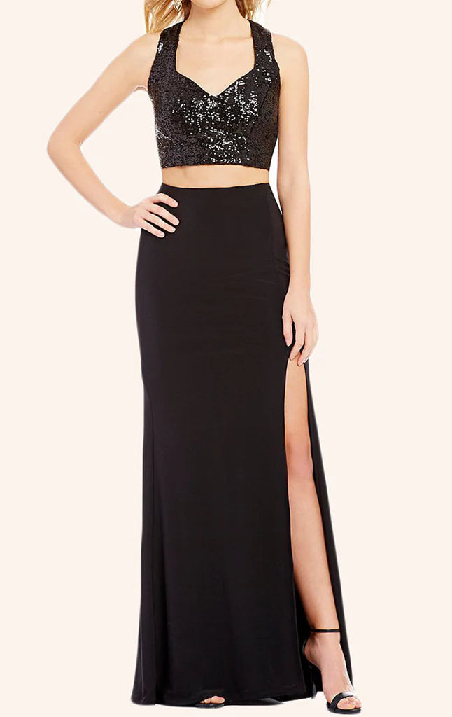 Woman wearing a sparkling two-piece sequin formal gown.
