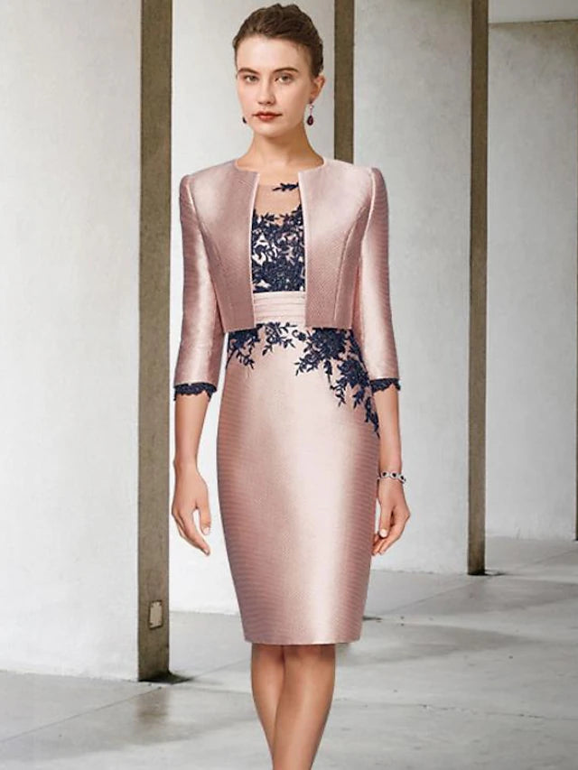 Woman wearing an elegant light blue two-piece sheath dress with a short jacket and lace details.