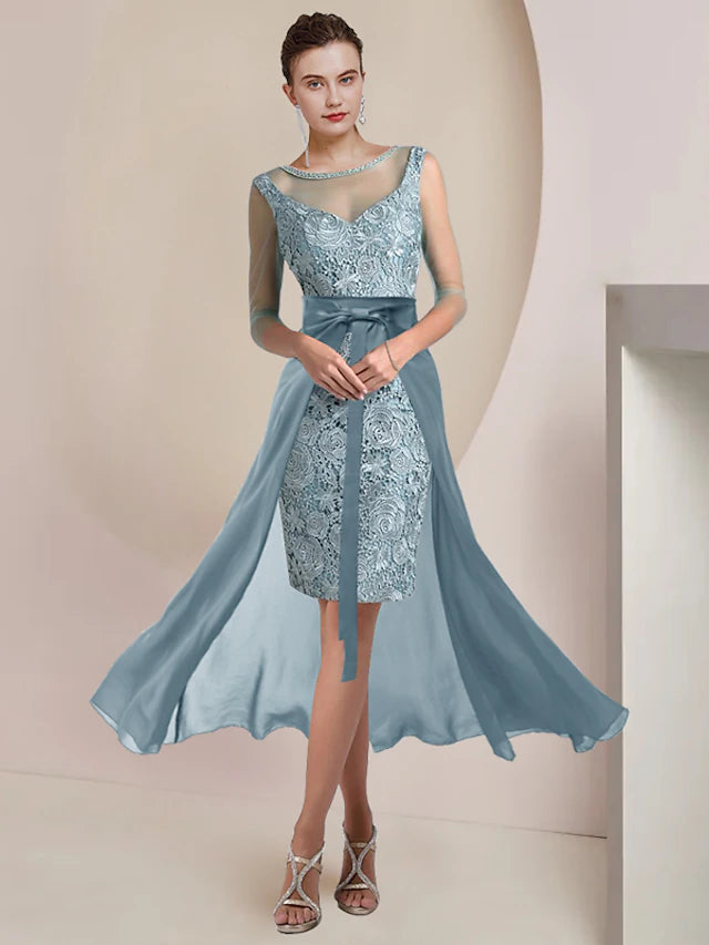Elegant two-piece sheath dress with jewel neck and 3/4 sleeves.