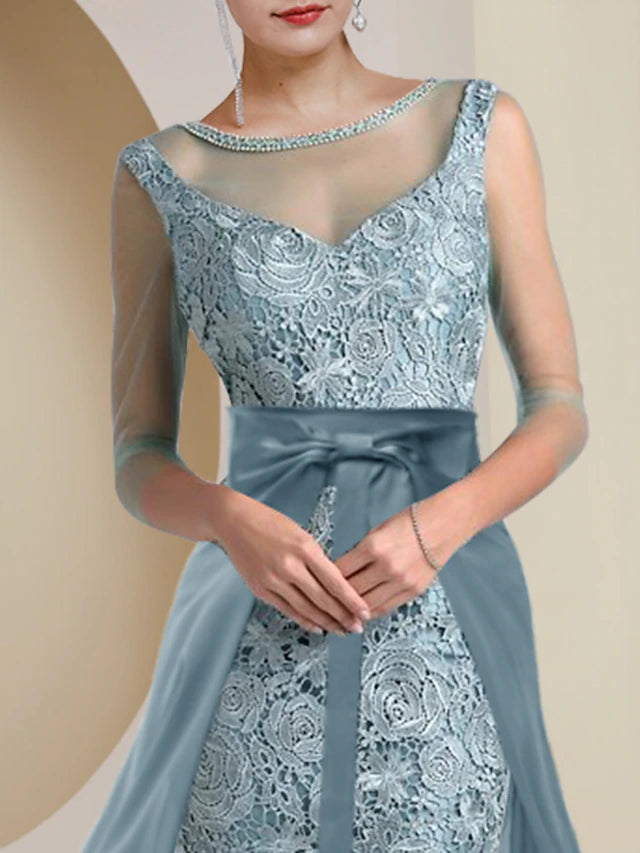 Back view of the tea length mother of the bride dress with lace and beading.