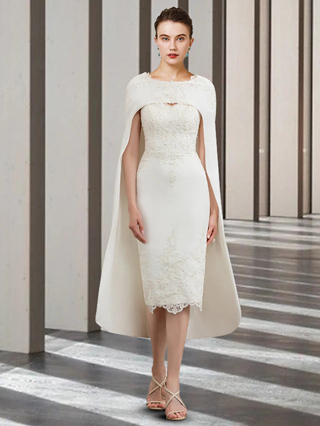 Elegant two-piece mother of the bride dress with jewel neck and lace details.