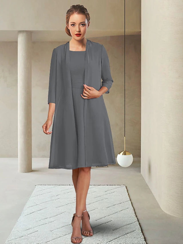 Elegant two-piece Mother of the Bride dress with jewel neck and chiffon jacket.