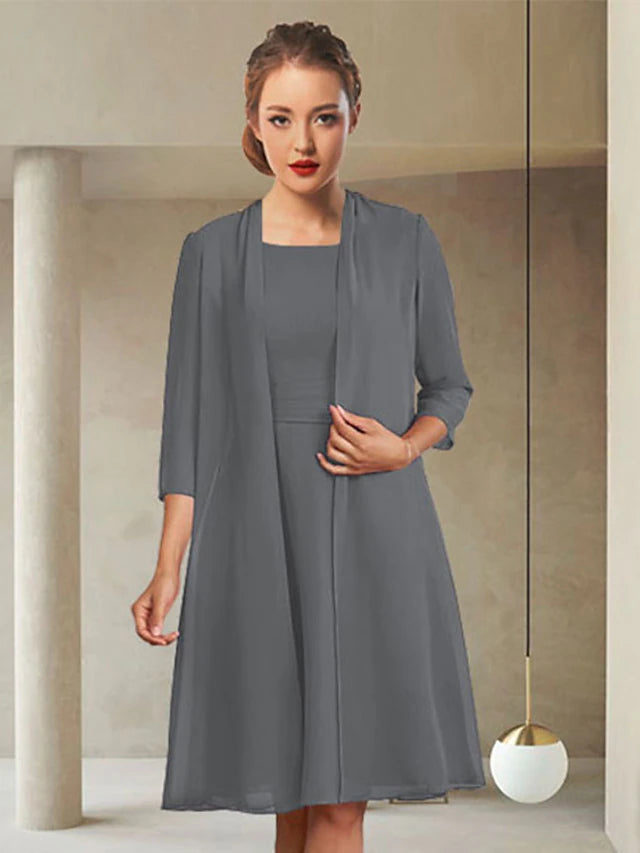 Side view of a knee-length sheath Mother of the Bride dress with ruching.