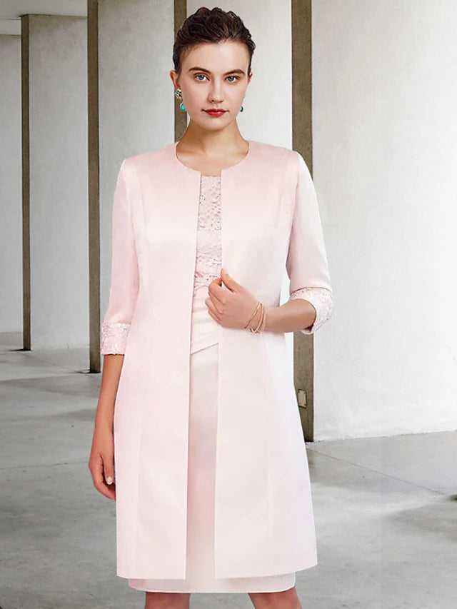 Elegant two-piece sheath mother of the bride dress with jewel neck and half sleeve jacket.