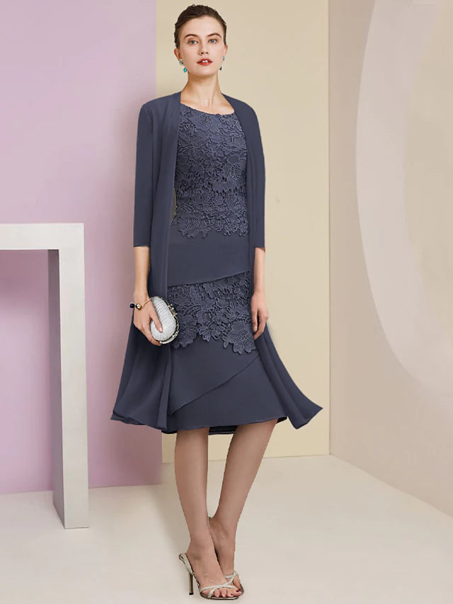 Elegant two-piece sheath dress with short sleeve jacket and jewel neck.