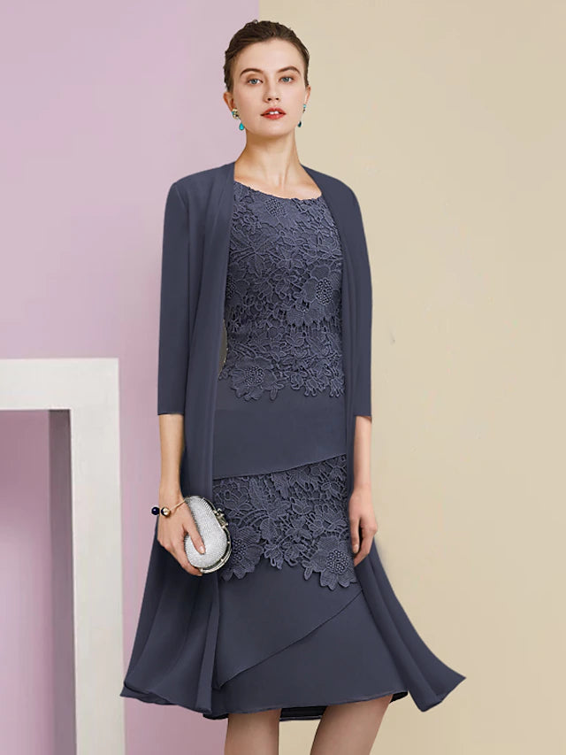 Back view of the elegant two-piece sheath dress with tier appliques.
