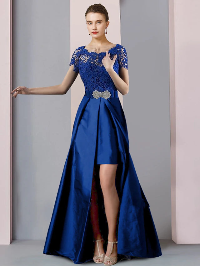 Elegant two-piece sheath Mother of the Bride dress with detachable lace overlay and crystal brooch.