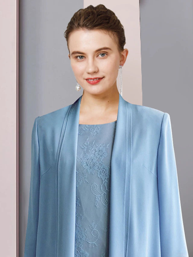 Back view of the tea-length formal dress showing solid color chiffon fabric.