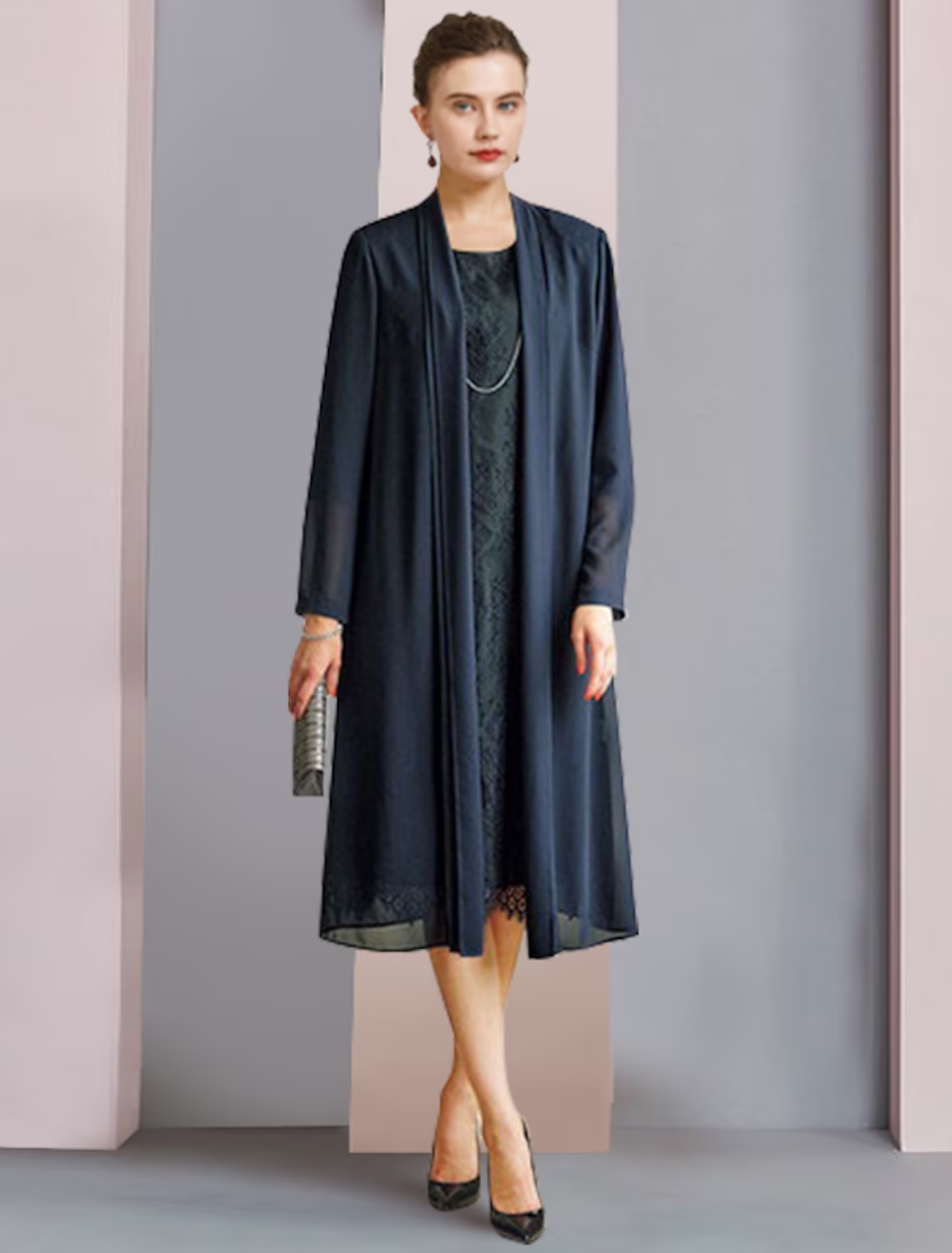 Close-up of the lace detail on the 3/4 length sleeve of the formal dress.