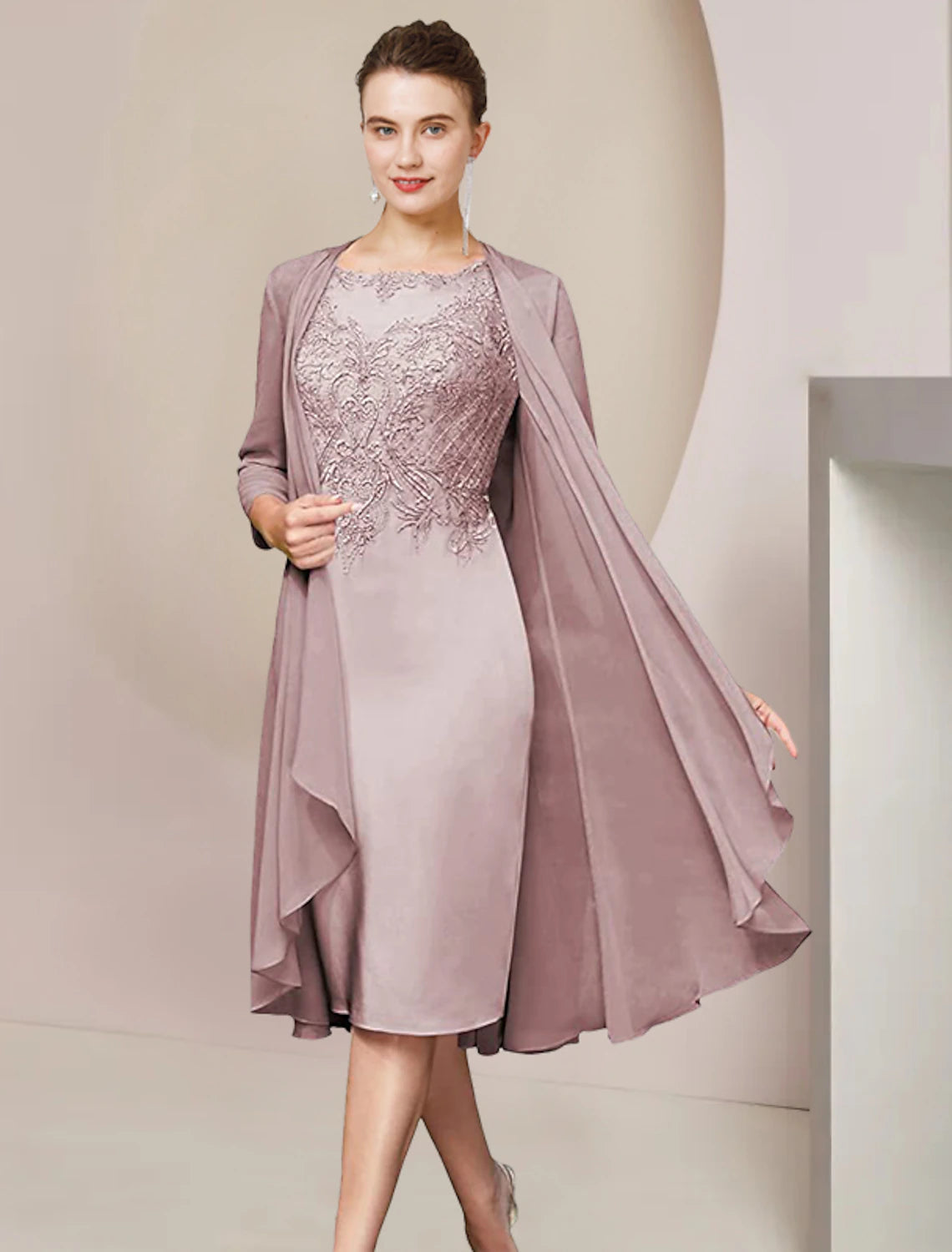 Back view of the knee-length sheath dress, highlighting its elegant silhouette.