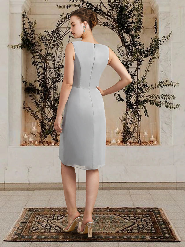 Side view of the two-piece sheath dress, highlighting the knee-length design and elegant flow.