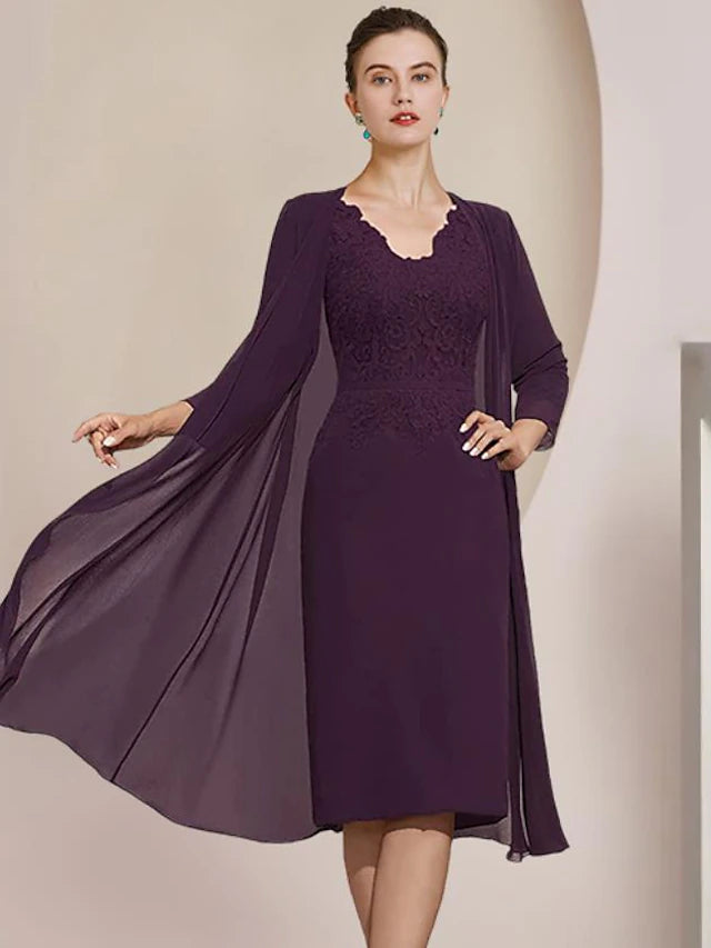 Elegant two-piece V-neck sheath dress with short sleeve jacket and lace appliques.