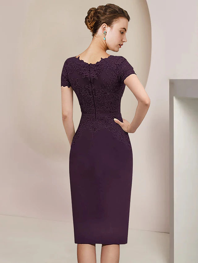 Back view of the knee-length sheath dress with short sleeve jacket.