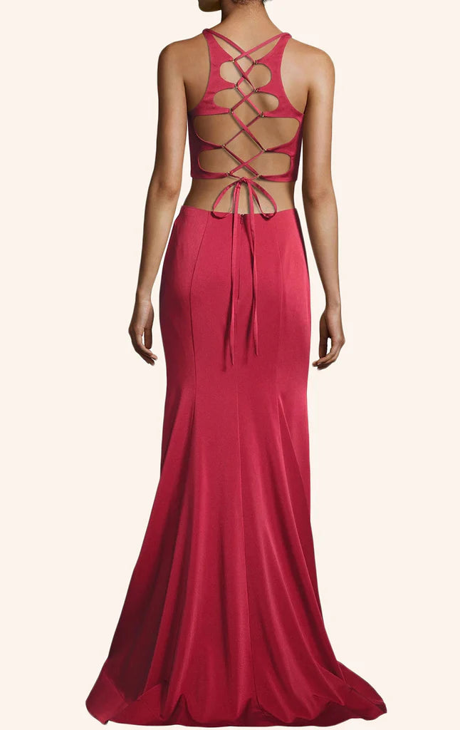 Back view of model in a two-piece sleeveless evening gown.