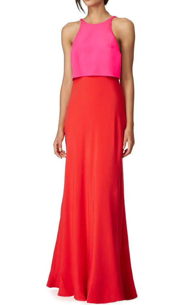 Model wearing an elegant two-piece sleeveless formal prom gown.