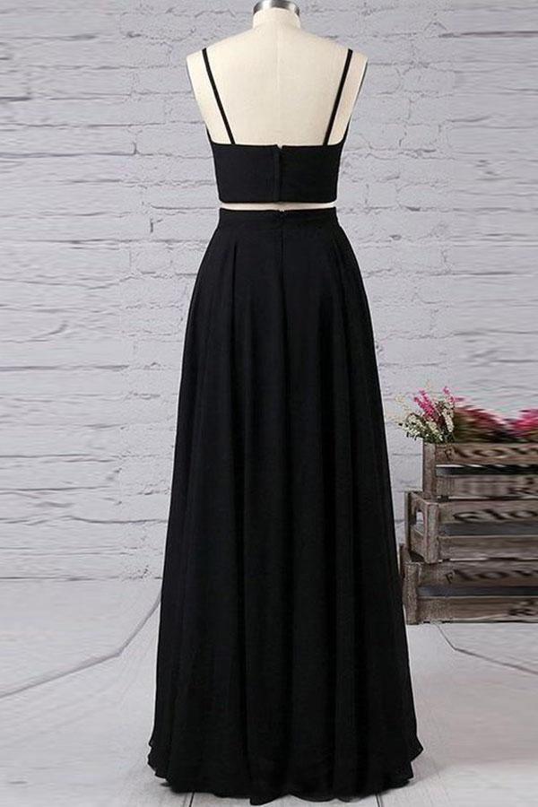 Elegant two-piece chiffon prom dress with spaghetti straps and a side slit.