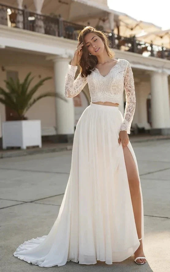 Elegant two-piece V-neck lace long sleeve wedding dress with a sweep train.