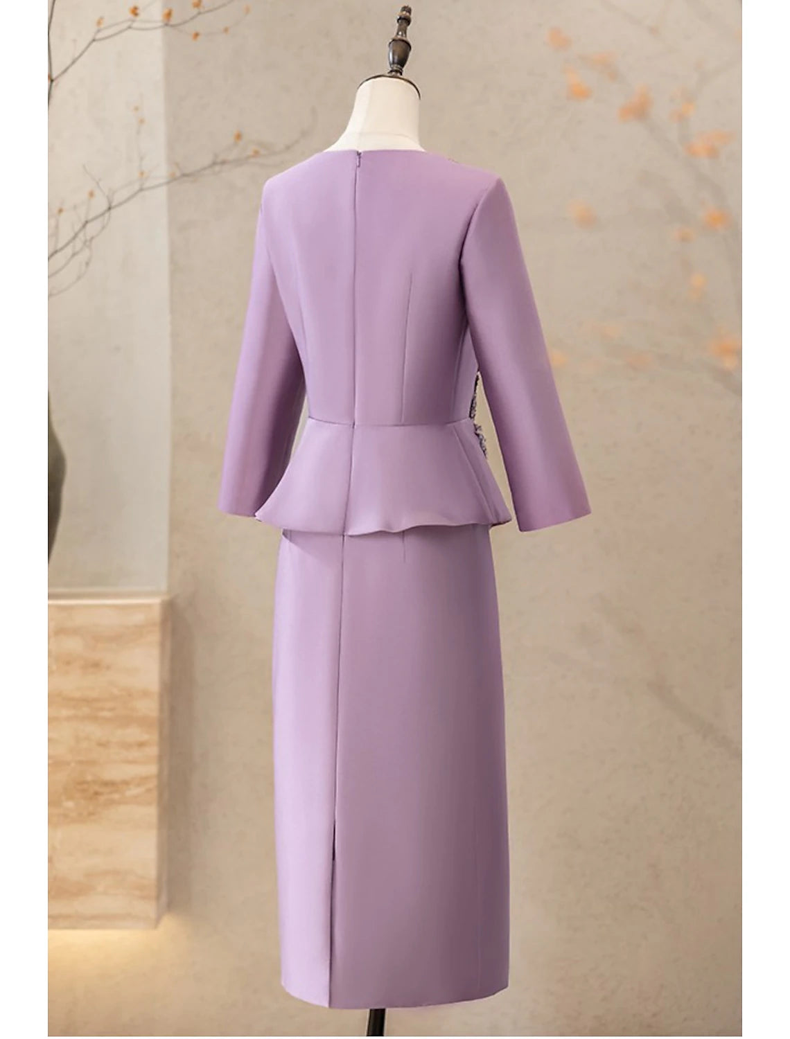 Side view of the two-piece V-neck long sleeve satin cocktail dress with appliques.